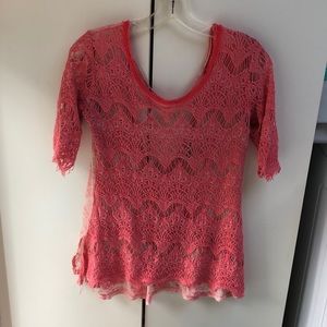 It’s a fun lace and see through back .